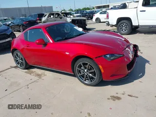 2017 Mazda MX-5 Miata Grand Touring z VIN JM1NDAM72H0104850, wystawiony jako IAAI lot #41995874 z przebiegiem 23 891 mil mil oraz . Historia ofert i sprzedaży dostępna na DreamBid. Obrazek 1.