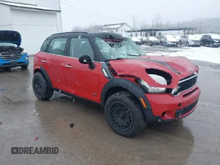 2014 MINI Countryman S z VIN WMWZC5C57EWM17149, wystawiony jako IAAI lot #41246831 z przebiegiem 112 369 mil mil oraz . Historia ofert i sprzedaży dostępna na DreamBid. Obrazek 1.