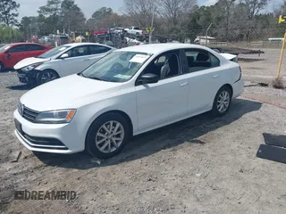 2015 Volkswagen Jetta Sedan 1.8T SE with VIN 3VWD17AJXFM249990, listed as a IAAI auction lot 41810073 with 127,683 mi miles. Bid and sale history available at carsss.com. Image 2.