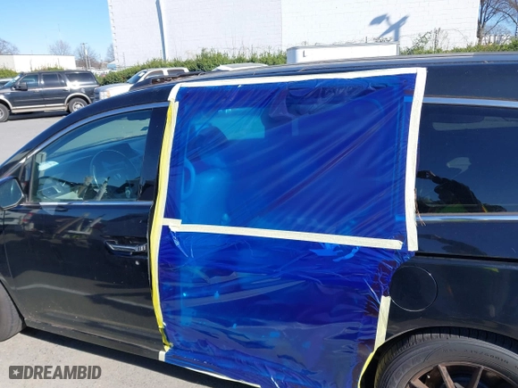 2013 Honda Odyssey Touring with VIN 5FNRL5H99DB076385, listed as a IAAI auction lot 41751504 with 233,875 mi miles. Bid and sale history available at carsss.com. Image 14.