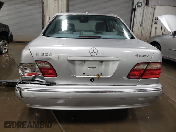 2000 Mercedes-Benz E-Class with VIN WDBJF82J1YX030388, listed as a Copart auction lot 86384974 with 212,596 mi miles and Salvage Title. Bid and sale history available at carsss.com. Image 6.