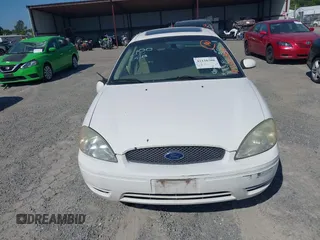 2006 Ford Taurus SEL with VIN 1FAFP56U76A201559, listed as a IAAI auction lot 42126308 with 164,000 mi miles and . Bid and sale history available at DreamBid. Image 12.