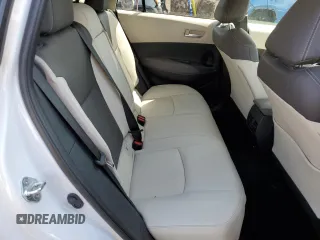 2023 Toyota Corolla Cross XLE z VIN 7MUDAABG8PV072480, wystawiony jako Copart lot #53847495 z przebiegiem 47 754 mil mil oraz Szkody całkowita. Historia ofert i sprzedaży dostępna na DreamBid. Obrazek 11.