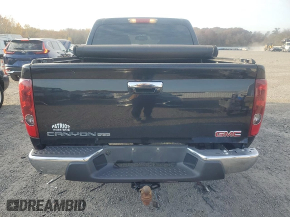 2011 GMC Canyon SLE1 with VIN 1GTH6MFE5B8105214, listed as a Copart auction lot 77962574 with 192,307 mi miles and Clean Title. Bid and sale history available at carsss.com. Image 6.