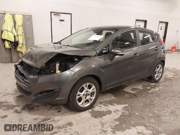 2015 Ford Fiesta SE z VIN 3FADP4EJ8FM138306, wystawiony jako IAAI lot #41227124 z przebiegiem 106 741 mil mil oraz . Historia ofert i sprzedaży dostępna na DreamBid. Obrazek 17.