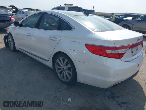 2015 Hyundai Azera Limited with VIN KMHFH4JG7FA476458, listed as a IAAI auction lot 41893979 with 149,114 mi miles and . Bid and sale history available at DreamBid. Image 3.