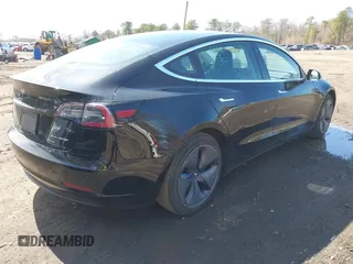 2020 Tesla Model 3 Long Range with VIN 5YJ3E1EB6LF600266, listed as a IAAI auction lot 41819374 with 28,406 mi miles. Bid and sale history available at carsss.com. Image 4.