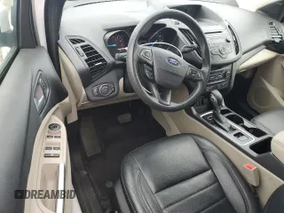 2018 Ford Escape SE z VIN 1FMCU9GD5JUB29050, wystawiony jako Copart lot #55166745 z przebiegiem 79 939 mil mil oraz Czysty tytuł • Clean title. Historia ofert i sprzedaży dostępna na DreamBid. Obrazek 8.