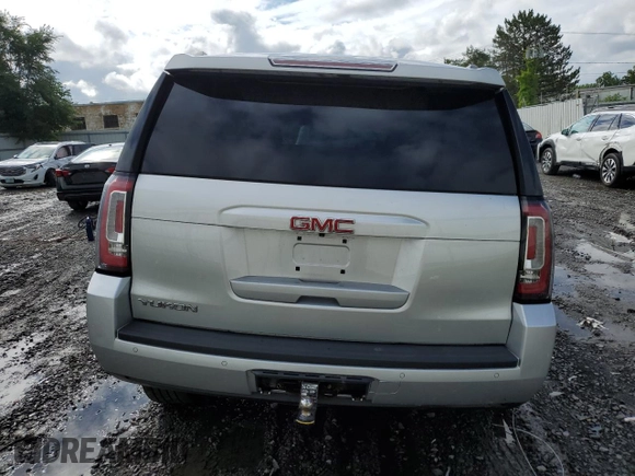 2015 GMC Yukon SLT with VIN 1GKS2BKC9FR518381, listed as a Copart auction lot 66352864 with 103,419 mi miles and Salvage Title. Bid and sale history available at DreamBid. Image 6.