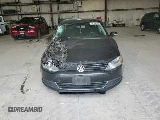 2013 Volkswagen Jetta SE with VIN 3VWDX7AJXDM427263, listed as a Copart auction lot 52502585 with 243,457 mi miles and Salvage title. Bid and sale history available at DreamBid. Image 10.