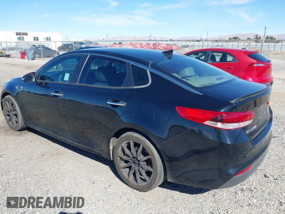 2016 Kia Optima LX with VIN 5XXGT4L32GG108695, listed as a IAAI auction lot 41647970 with 125,319 mi miles. Bid and sale history available at carsss.com. Image 3.