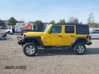 2019 Jeep Wrangler Unlimited Sport S with VIN 1C4HJXDG4KW579364, listed as a IAAI auction lot 41809318 with 22,370 mi miles and . Bid and sale history available at DreamBid. Image 14.