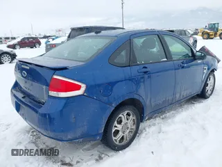 2008 Ford Focus SE with VIN 1FAHP35N58W185875, listed as a IAAI auction lot 41569411 with 185,579 mi miles. Bid and sale history available at carsss.com. Image 4.