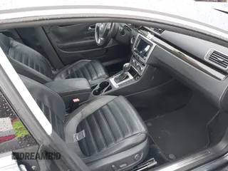 2014 Volkswagen CC Lux with VIN WVWRP7AN6EE520381, listed as a IAAI auction lot 41338169 with 130,363 mi miles. Bid and sale history available at carsss.com. Image 5.