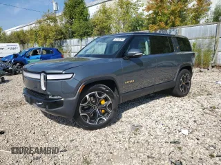 2023 Rivian R1S Adventure z VIN 7PDSGABAXPN010623, wystawiony jako Copart lot #72176294 z przebiegiem Nie podano mil oraz Szkody całkowita. Historia ofert i sprzedaży dostępna na DreamBid. Obrazek 1.