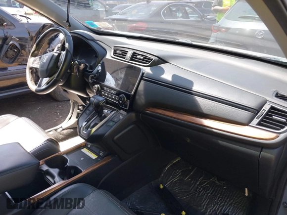 2020 Honda CR-V Touring with VIN 2HKRW2H95LH609144, listed as a IAAI auction lot 41982411 with 36,374 mi miles and . Bid and sale history available at DreamBid. Image 5.