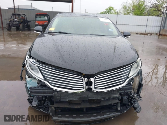 2015 Lincoln MKZ z VIN 3LN6L2G90FR621891, wystawiony jako IAAI lot #41968088 z przebiegiem 128 988 mil mil oraz . Historia ofert i sprzedaży dostępna na DreamBid. Obrazek 13.