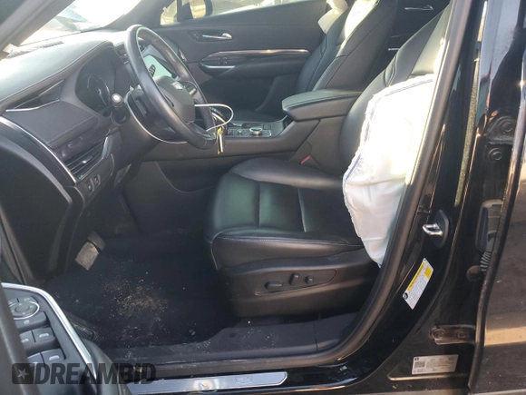 2021 Cadillac XT4 FWD Luxury с VIN 1GYAZAR4XMF066381, выставлен на аукционе Copart как лот 84615464 с пробегом 80 018 миль миль и Списание • Salvage title. История ставок и продаж доступна на DreamBid. Изображение 7.