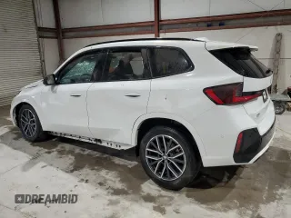 2023 BMW X1 xDrive28i with VIN WBX73EF08P5X60980, listed as a Copart auction lot 59899385 with 21,975 mi miles and Salvage title. Bid and sale history available at DreamBid. Image 2.