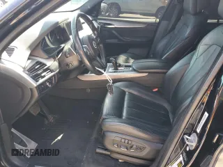 2014 BMW X5 xDrive50i with VIN 5UXKR6C54E0J72983, listed as a Copart auction lot 51047625 with 100,692 mi miles and Salvage Title. Bid and sale history available at carsss.com. Image 7.