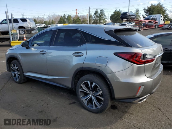 2019 Lexus RX with VIN 2T2BZMCA6KC208074, listed as a Copart auction lot 49067185 with 124,649 mi miles and Salvage Title. Bid and sale history available at carsss.com. Image 2.