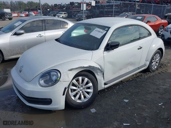 2016 Volkswagen Beetle Coupe 1.8T Wolfsburg Edition with VIN 3VWF17AT0GM607755, listed as a IAAI auction lot 41508585 with 52,913 mi miles. Bid and sale history available at carsss.com. Image 2.