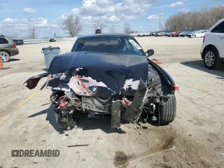 1999 BMW 3 Series 328is with VIN WBABG1335XET08193, listed as a Copart auction lot 50637465 with 0 mi miles and Salvage Title. Bid and sale history available at carsss.com. Image 5.