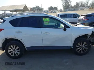 2013 Mazda CX-5 Sport with VIN JM3KE2BE4D0153251, listed as a IAAI auction lot 42297235 with 177,019 mi miles and . Bid and sale history available at DreamBid. Image 13.