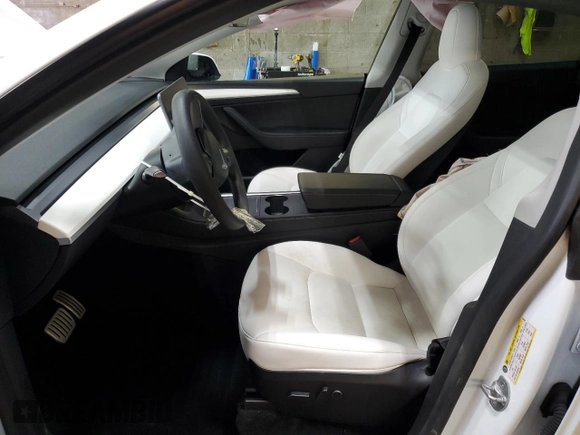 2023 Tesla Model Y Performance z VIN 7SAYGDEF6PF798103, wystawiony jako Copart lot #53607895 z przebiegiem 22 334 mil mil oraz Szkoda całkowita • Salvage title. Historia ofert i sprzedaży dostępna na DreamBid. Obrazek 7.