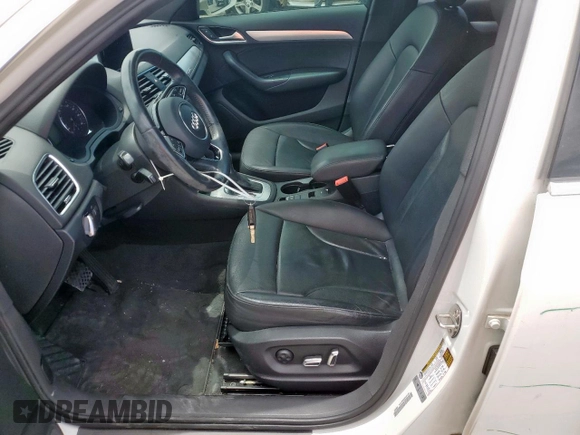 2016 Audi Q3 Premium Plus with VIN WA1EFCFS6GR005296, listed as a Copart auction lot 55215265 with 104,899 mi miles and Salvage title. Bid and sale history available at DreamBid. Image 7.