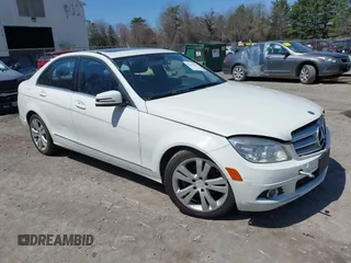 2011 Mercedes-Benz C with VIN WDDGF8BBXBR174317, listed as a IAAI auction lot 42116532 with 121,227 mi miles. Bid and sale history available at carsss.com. Image 1.