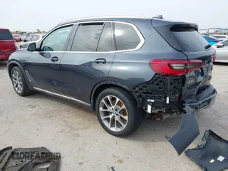 2019 BMW X5 xDrive40i with VIN 5UXCR6C59KLL08488, listed as a IAAI auction lot 41724824 with 57,334 mi miles. Bid and sale history available at carsss.com. Image 3.