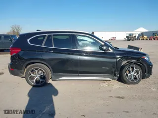 2018 BMW X1 sDrive28i with VIN WBXHU7C37J5H43318, listed as a IAAI auction lot 41294730 with 73,600 mi miles. Bid and sale history available at carsss.com. Image 13.