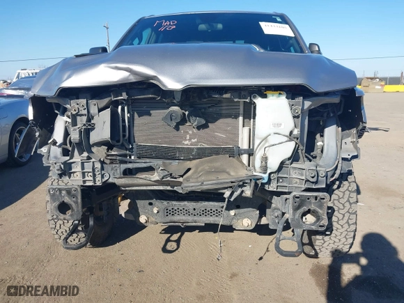 2019 Ram 1500 Rebel with VIN 1C6RRFEG8KN887978, listed as a IAAI auction lot 41433105 with 103,965 mi miles. Bid and sale history available at carsss.com. Image 6.