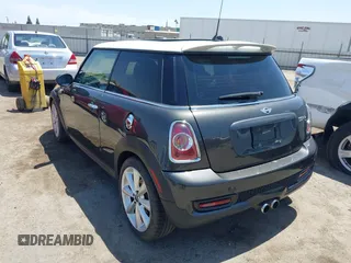 2013 MINI Hardtop S with VIN WMWSV3C52DT396453, listed as a IAAI auction lot 42583892 with 143,190 mi miles and . Bid and sale history available at DreamBid. Image 3.