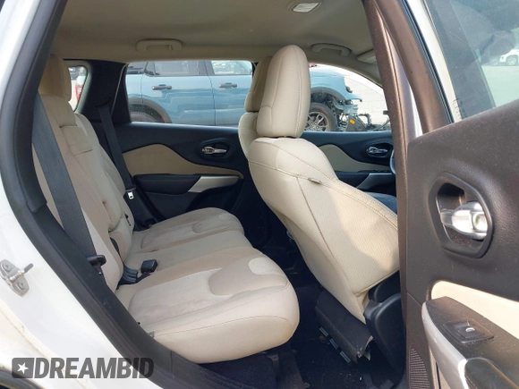 2017 Jeep Cherokee Sport with VIN 1C4PJMAB5HW619883, listed as a IAAI auction lot 42412423 with 177,063 mi miles and . Bid and sale history available at DreamBid. Image 8.