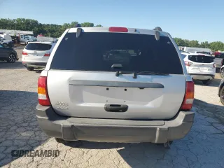 2004 Jeep Grand Cherokee Laredo z VIN 1J4GW48S94C425242, wystawiony jako Copart lot #63118015 z przebiegiem 157 076 mil mil oraz Czysty tytuł • Clean title. Historia ofert i sprzedaży dostępna na DreamBid. Obrazek 6.