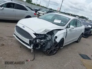 2020 Ford Fusion Titanium с VIN 3FA6P0D98LR151810, выставлен на аукционе IAAI как лот 42590902 с пробегом 76 624 миль миль и . История ставок и продаж доступна на DreamBid. Изображение 17.