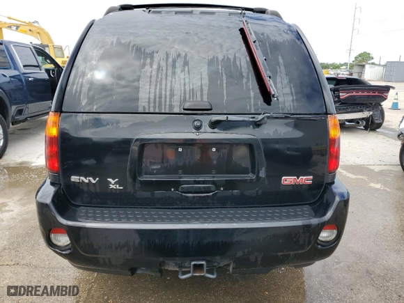 2006 GMC Envoy XL Denali with VIN 1GKES66M066115382, listed as a Copart auction lot 64031054 with 222,143 mi miles and Salvage Title. Bid and sale history available at carsss.com. Image 6.