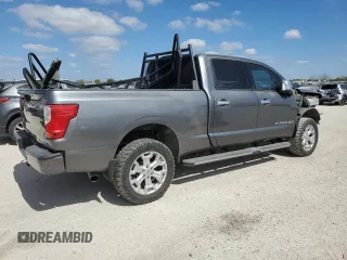 2016 Nissan Titan XD PRO-4X with VIN 1N6BA1F47GN512757, listed as a Copart auction lot 77429314 with 152,756 mi miles and Salvage Title. Bid and sale history available at carsss.com. Image 3.
