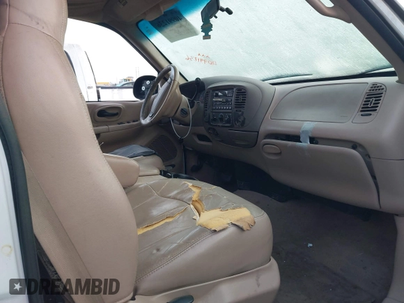 1999 Ford F-150 XL with VIN 1FTRX18L1XKB61205, listed as a IAAI auction lot 40991236 with 178,889 mi miles. Bid and sale history available at carsss.com. Image 5.
