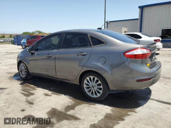 2014 Ford Fiesta SE z VIN 3FADP4BJ4EM110277, wystawiony jako Copart lot #56921115 z przebiegiem 126 536 mil mil oraz Szkoda całkowita • Salvage title. Historia ofert i sprzedaży dostępna na DreamBid. Obrazek 2.
