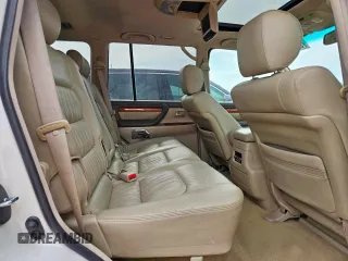 2004 Lexus LX 470 z VIN JTJHT00W743542910, wystawiony jako Copart lot #57187445 z przebiegiem 236 985 mil mil oraz Szkoda całkowita • Salvage title. Historia ofert i sprzedaży dostępna na DreamBid. Obrazek 11.