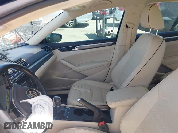 2018 Volkswagen Passat 2.0T S with VIN 1VWAA7A31JC015784, listed as a IAAI auction lot 41829586 with 72,437 mi miles. Bid and sale history available at carsss.com. Image 5.