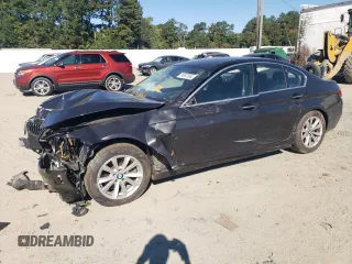 2015 BMW 5 Series 528i xDrive with VIN WBA5A7C55FD620599, listed as a Copart auction lot 74997904 with 119,474 mi miles and Salvage title. Bid and sale history available at DreamBid. Image 1.