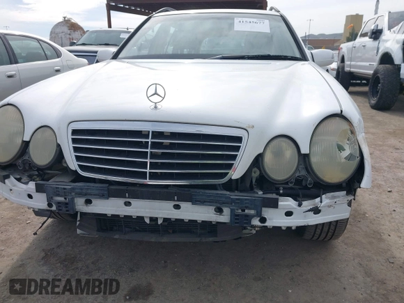 2001 Mercedes-Benz E-Class with VIN WDBJH65J31B364290, listed as a IAAI auction lot 41545677 with 162,040 mi miles. Bid and sale history available at carsss.com. Image 6.