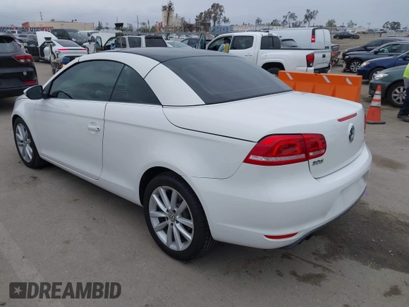 2012 Volkswagen Eos Komfort with VIN WVWBW7AH6CV004193, listed as a IAAI auction lot 42194925 with 71,401 mi miles and . Bid and sale history available at DreamBid. Image 3.