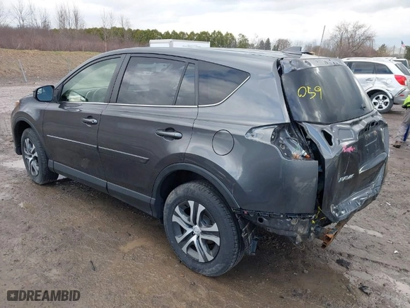 2018 Toyota RAV4 LE with VIN JTMBFREV8JJ184809, listed as a IAAI auction lot 41901048 with 76,699 mi miles. Bid and sale history available at carsss.com. Image 3.