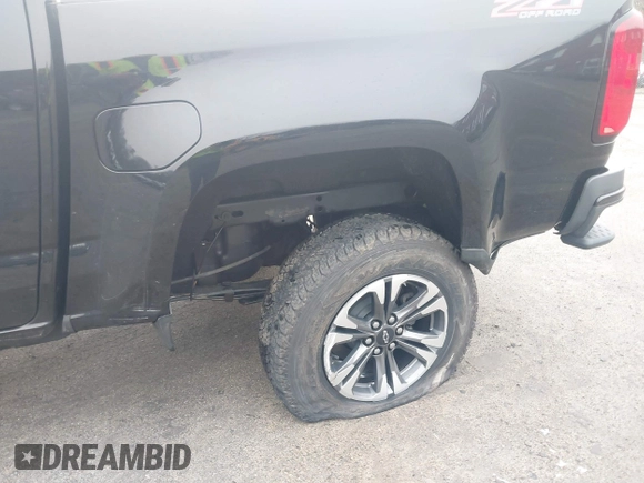 2021 Chevrolet Colorado 4WD Z71 with VIN 1GCGTDEN8M1226062, listed as a IAAI auction lot 41723424 with 20,956 mi miles and . Bid and sale history available at DreamBid. Image 6.