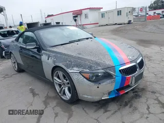 2007 BMW 6 Series 650i with VIN WBAEK13507CN81020, listed as a IAAI auction lot 42167743 with 127,552 mi miles. Bid and sale history available at carsss.com. Image 1.